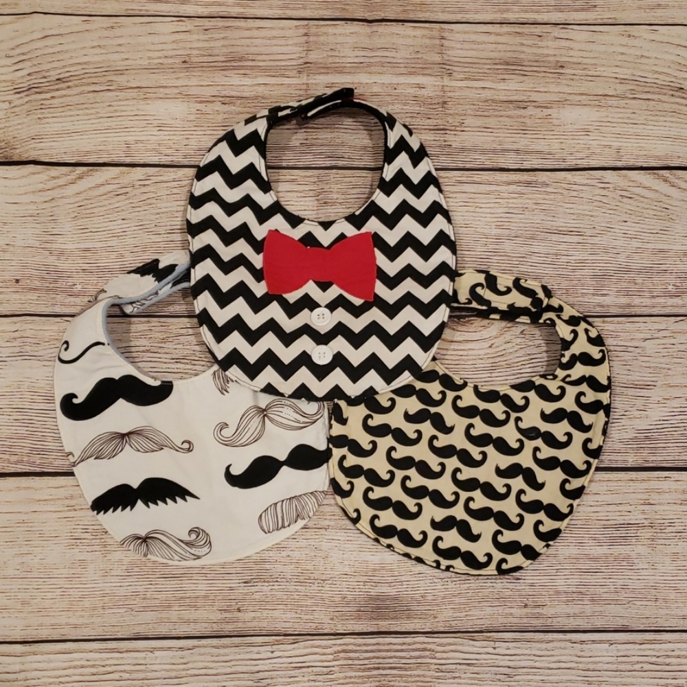 3 custom-made bibs
